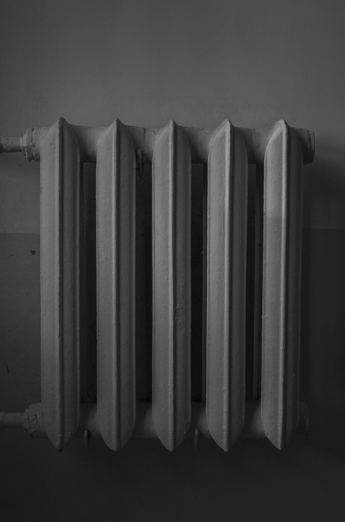 White panel radiator on a wall in a home